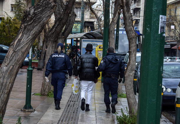 Greek Police detain irregular migrants without legal documents Greek Police officers detain irregular migrants without legal residence permit in the Aghios Panteleimonas area in central Athens, a district with high immigrant population. Athens Greece Copyright: DimitrisxAspiotis