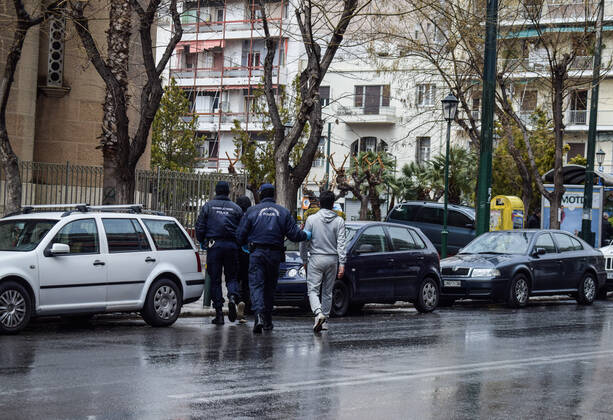 Greek Police detain irregular migrants without legal documents Greek Police officers detain irregular migrants without legal residence permit in the Aghios Panteleimonas area in central Athens, a district with high immigrant population. Athens Greece Copyright: DimitrisxAspiotis