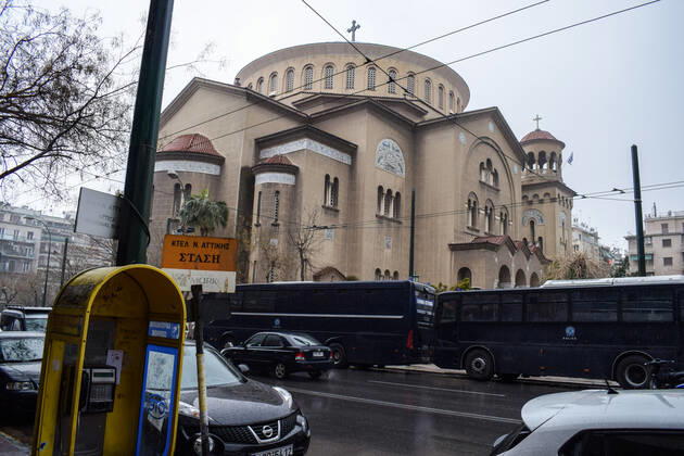 Greek Police detain irregular migrants without legal documents Two police buses are parked outside Aghios Panteleimonas church in order to transfer the detained to the camps. Greek Police officers inspect documents and detain irregular migrants without legal residence permit in the Aghios Panteleimonas area in central Athens, a district with high immigrant population. Athens Greece Copyright: DimitrisxAspiotis