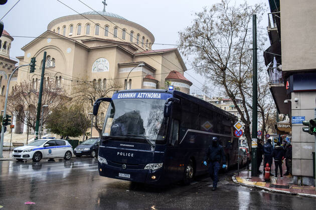 Greek Police detain irregular migrants without legal documents Police buses are parked outside Aghios Panteleimonas church in order to transfer the detained to the camps. Greek Police officers inspect documents and detain irregular migrants without legal residence permit in the Aghios Panteleimonas area in central Athens, a district with high immigrant population. Athens Greece Copyright: DimitrisxAspiotis