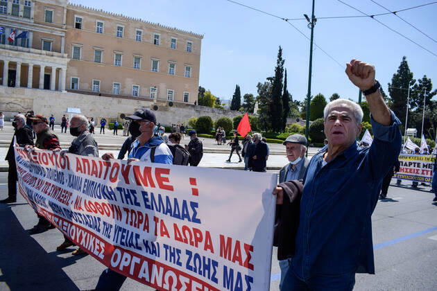 Greece: Thousands take to Athens streets in protest of price hikes Pensioners protest ahead of the Parliament holding banner that reads: No involvement of Greece in the war. Increase wages and pensions. Decrease prices of basic needs Athens Greece Copyright: DimitrisxAspiotis