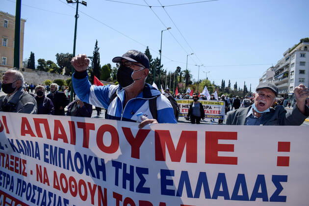 Greece: Thousands take to Athens streets in protest of price hikes Pensioners protest holding banner that reads: No involvement of Greece in the war. Increase wages and pensions. Decrease prices of basic needs Athens Greece Copyright: DimitrisxAspiotis