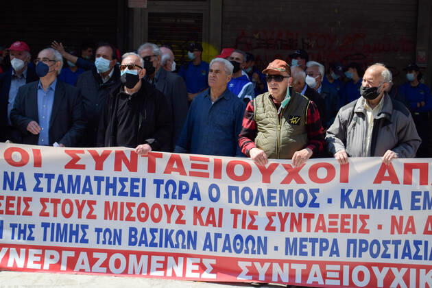 Greece: Thousands take to Athens streets in protest of price hikes Pensioners demonstrate outside Labor Ministry holding banner that reads: No involvement of Greece in the war. Increase wages and pensions. Decrease prices of basic needs Athens Greece Copyright: DimitrisxAspiotis