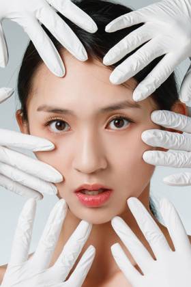 Ready to do plastic surgery of young women China, 09 08 2021, model released, Copyright: xViewxStockx, cpmh-252349f05q.jpg, medical cosmetology,Plastic Surgery,Beauty Treatment,Beauty,Women,Young Women,Human Face,Human Skin,Clean,Human Hand,Surgical Glove,Touching,Doctor,Beautician,Surgery,facelift,Healthcare And Medicine,Medical Supplies,Anti Aging,Beautiful,Change,Asia,Asian and Indian Ethnicities,East Asia,Oriental Ethnicity,People,china,Chinese Ethnicity,Adult,Young Adult,Two People,Part Of,Perfection,Self Improvement,Charming,Pampering,Wellbeing,Smooth,Day,Indoors,Studio Shot,White Background,Incidental People,Vertical,Color Image,Photography,18-19 Years,30-34 Years Copyright: xViewxStockx