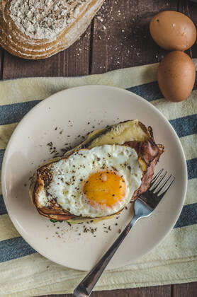 Croque madame delicious french breakfast with ham, cheese, egg and spinach with garlic , 22989814.jpg, croque, madame, breakfast, egg, sandwich, ham, french, monsieur, fried, cheese, food, bread, toast, white, cuisine, melted, traditional, yolk, plate, toasted, closeup, fast, eggs, coffee, meal, lunch, hot, sauce, tasty, delicious, baked, bechamel, sunny, snack, france, salad, fresh, grilled, madam, dish, lettuce, original, hard, spinach, garlic, bio, organic, dark, darkness, old school,