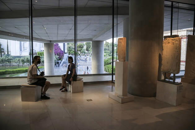 Tourists and locals visit the Acropolis Museum in Athens during International Museum Day Tourists and locals visit the Acropolis Museum in Athens and enjoy free entrance as part of the celebrations on International Museum Day. Athens Greece Copyright: DimitrisxAspiotis