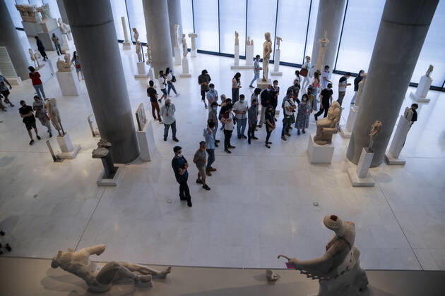 Tourists and locals visit the Acropolis Museum in Athens during International Museum Day Tourists and locals visit the Acropolis Museum in Athens and enjoy free entrance as part of the celebrations on International Museum Day. Athens Greece Copyright: DimitrisxAspiotis