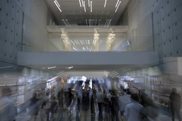 Tourists and locals visit the Acropolis Museum in Athens during International Museum Day Tourists and locals visit the Acropolis Museum in Athens and enjoy free entrance as part of the celebrations on International Museum Day. Athens Greece Copyright: DimitrisxAspiotis