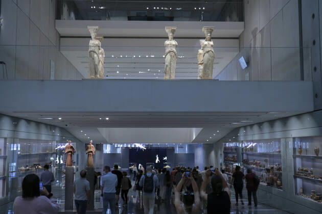 Tourists and locals visit the Acropolis Museum in Athens during International Museum Day Tourists and locals visit the Acropolis Museum in Athens and enjoy free entrance as part of the celebrations on International Museum Day. Athens Greece Copyright: DimitrisxAspiotis
