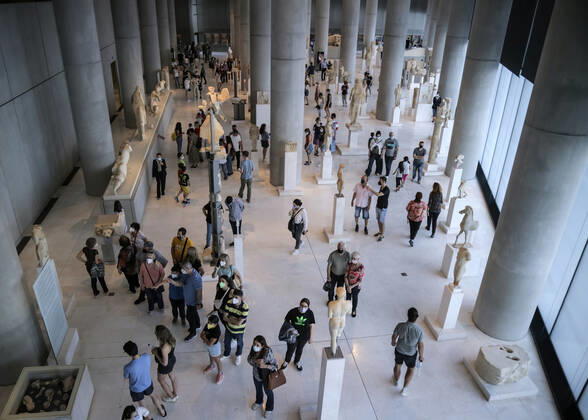 Tourists and locals visit the Acropolis Museum in Athens during International Museum Day Tourists and locals visit the Acropolis Museum in Athens and enjoy free entrance as part of the celebrations on International Museum Day. Athens Greece Copyright: DimitrisxAspiotis