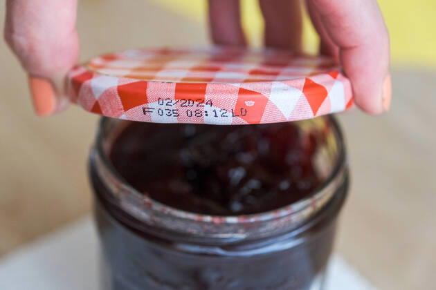 Düsseldorf 19 06 2022 cherry jam jam jar breakfast jam food expiration date expiration date freshness date best before date fruits pome fruit use by date sugar content fructose content painted fingernails fingernail nail polish Düsseldorf North Rhine Westphalia Germany