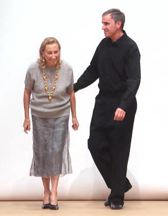 June 19, 2022, Milan, Italy: Miuccia Prada, left, and Raf Simons accept applause after the Spring Summer 2023 menswear collection by Prada during the Milan Men s Fashion Week, in Milan, Italy, 19 June 2022. The Milano Moda Uomo displays Spring Summer 2023 collections and runs from 17 to 21 June. .ANSA MATTEO BAZZI Milan Italy  - ZUMAa110 20220619_zaf_a110_016 Copyright: xMatteoxBazzix