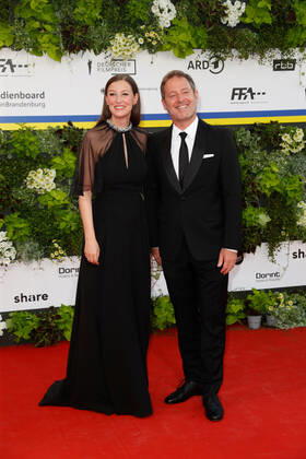 German Film Award 2022 Alexandra Maria Lara with Florian Gallenberger on the red carpet at the Lola German Film Award 2021 ceremony at the Palais am Funkturm in Messe Berlin Copyright: xEventpressxGolejewskix