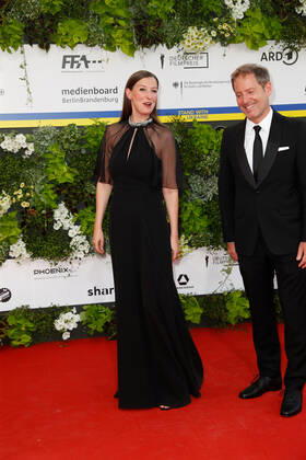 German Film Award 2022 Alexandra Maria Lara with Florian Gallenberger on the red carpet at the Lola German Film Award 2021 ceremony at the Palais am Funkturm in Messe Berlin Copyright: xEventpressxGolejewskix