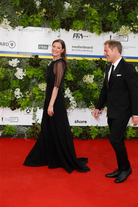 German Film Award 2022 Alexandra Maria Lara with Florian Gallenberger on the red carpet at the Lola German Film Award 2021 ceremony at the Palais am Funkturm in Messe Berlin Copyright: xEventpressxGolejewskix