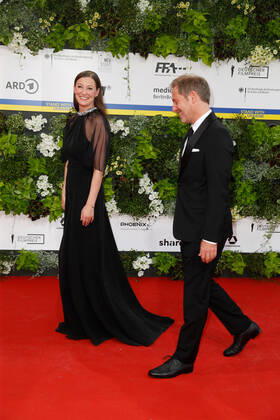 German Film Award 2022 Alexandra Maria Lara with Florian Gallenberger on the red carpet at the Lola German Film Award 2021 ceremony at the Palais am Funkturm in Messe Berlin Copyright: xEventpressxGolejewskix