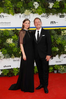 German Film Award 2022 Alexandra Maria Lara with Florian Gallenberger on the red carpet at the Lola German Film Award 2021 ceremony at the Palais am Funkturm in Messe Berlin Copyright: xEventpressxGolejewskix