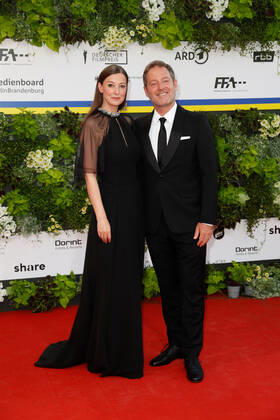 German Film Award 2022 Alexandra Maria Lara with Florian Gallenberger on the red carpet at the Lola German Film Award 2021 ceremony at the Palais am Funkturm in Messe Berlin Copyright: xEventpressxGolejewskix