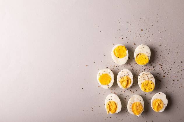 Overhead view of peppercorn seasoning on boiled white eggs by copy space on gray background Overhead view of peppercorn seasoning on boiled white eggs by copy space on gray background. unaltered, food, healthy eating and organic concept., model released, , property released, Cape Town, South Africa, , 3133175.jpg, overhead view,peppercorn,seasoning,boiled,white,egg,copy space,gray background,unaltered,food,healthy eating,organic,concept,fresh,healthy,background,ingredient,isolated,diet,nutrition,vegetarian,closeup,delicious,fruit,natural,raw,design,vegetable,tasty,cooking,meal,sweet,green,overhead,view,copy,space,gray,eating