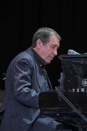 July 10, 2022, Great Tew, Oxfordshire, United Kingdom: Julian Michael Holland OBE aka Jools Holland, English pianist singer, songwriter, producer, composer, television presenter and former member of the band Squeeze, performing live on stage at Cornbury Festival. Great Tew United Kingdom - ZUMAs197 20220710_zaa_s197_319 Copyright: xDawnxFletcher-Parkx
