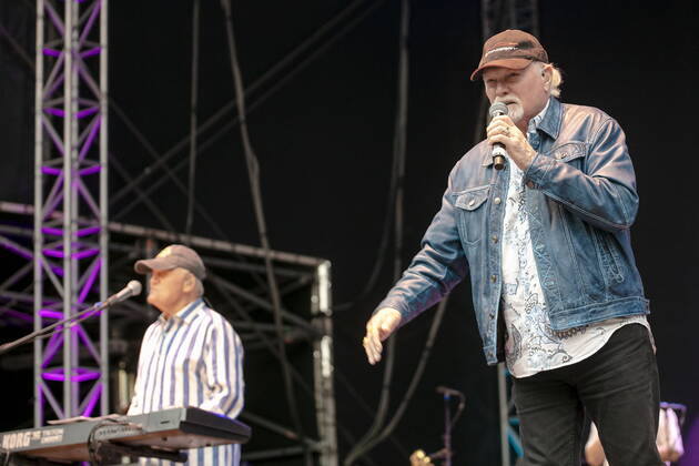 The Beach Boys Sixty Years of the Sound of Summer with Bruce Johnston li , keyboards from 1965, born 27 June 1942 in Chicago, Illinois, as Billy Baldwin and the last remaining founding member Mike Love re , lead vocals, born 15 March 1941 in Los Angeles, California as Michael Edward Love live during an open air performance at the Freilichtbühne Junge Gar