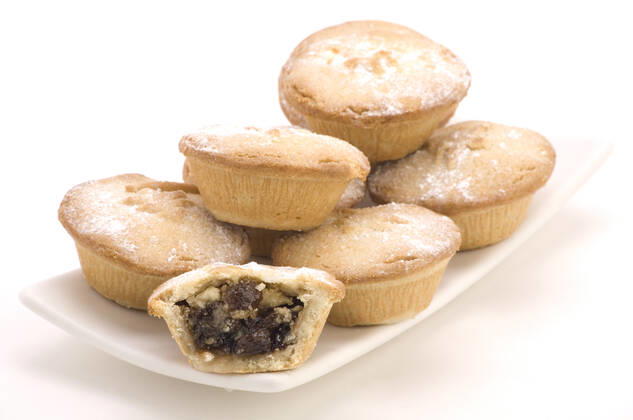 Multiple Mince Pies on a Plate isolated on a White background. Copyright: MartinxGarnham 30294068