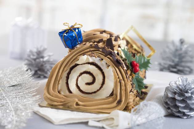 a yule log cake, traditional of christmas time , 19281670.jpg, Christmas, Shiny, Tradition, bright, buche, cake, celebrate, celebration, chocolate, coffe cream, confection, confectionery, cuisine, culinary, de, dessert, eating, festive, food, french, garland, gastronomy, genoise, golden, gourmet, horizontal, log, meal, new year, new years occasion, noel, ornament, ornamented, party, pastry, roll, season, seasonal, sponge, sweet, swiss, tinsel, traditional, typical, yule,