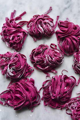 Homemade Beetroot Egg Pasta on a marble background Homemade Beetroot Egg Pasta on a marble background Copyright: xGeorgiaxMcDermottx GM270522-3