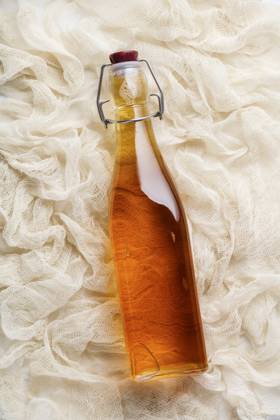 Fermented homemade drink, flat lay, healthy lifestyle concept Fermented homemade drink (kombucha, apple cider vinegar), flat lay Copyright: xNataliaxKlenovax NK131220-13