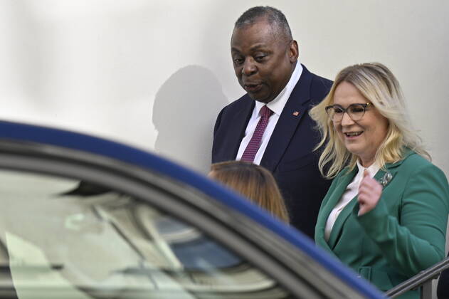 U.S. Secretary of Defense Lloyd Austin, left, and Czech Defence Minister Jana Cernochova, right, payd homage to the Czechoslovak paratroopers who killed Nazi Deputy Reichsprotector Reinhard Heydrich, Friday, Sept. 9, 2022, the Saint Cyril and Methodius Church, Prague, Czech Republic. (CTKxPhoto VitxSimanek) CTKPhotoP2022090903014
