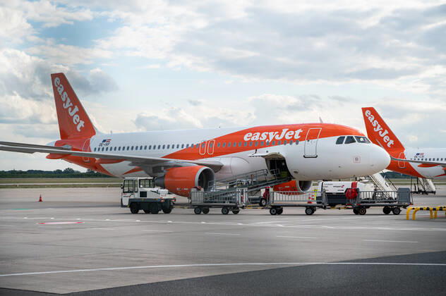 30 08 2022, Berlin, Germany, Europe An Airbus A320 200 passenger aircraft of EasyJet Europe with registration OE IVF is parked on the apron at Berlin Brandenburg Willy Brandt Airport EasyJet is a British multinational low-cost airline headquartered at London Luton Airport