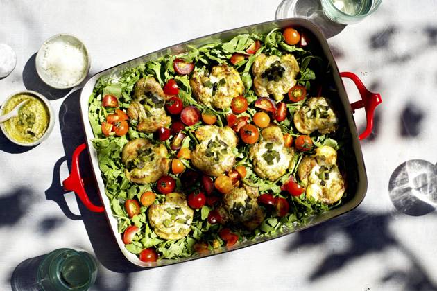 Roasted Poblano Pesto Smashed Potatoes served on a bed of arugula and cherry tomatoes Roasted Poblano Pesto Smashed Potatoes served on a bed of arugula and cherry tomatoes Copyright: xStephaniexMcKinniex SMC111119-4