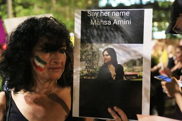 Demonstrators gather to rally against former Israeli Prime Minister Benjamin Netanyahu Demonstrators hold signs and Iranian flags as they protest against the death of Masha Amini and in solidarity with the Iranian protesters on October 29, 2022 in Tel Aviv, Israel. The march coincides with a series of similar events held today in cities around the world, in solidarity with Iranian activists driving a weeks-long protest movement in that country. Photo by Saeed Qaq apaimages Tel Aviv Tel Aviv Israel 291022_APA_SQ_00 (4) Copyright: xapaimagesxSaeedxQaq xapaimagesx