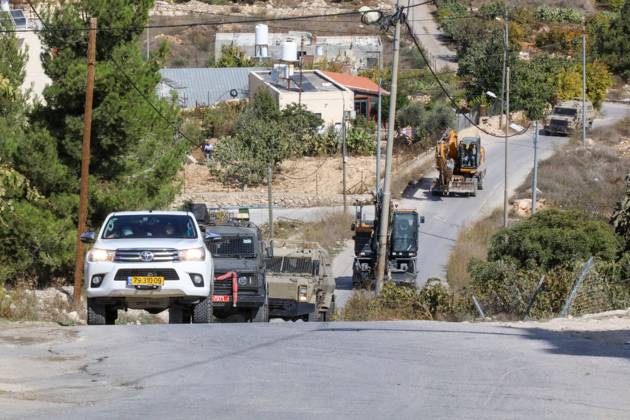 Israeli bulldozers demolish two Palestinian-owned houses in the village of al-Walaja, northwest of the West Bank city of Bethlehem Israeli bulldozers demolish two Palestinian-owned houses in the village of al-Walaja, northwest of the West Bank city of Bethlehem, Palestinain sources confirmed on November 2, 2022. Israeli forces raided the said village and demolished a house owned by local resident Othman al-Shweiki, and demolished another house owned by resident Khitam Ridwan. Photo by Ahmad Tayem APAimages Bethlehem West Bank Palestinian Territory 021122_Bethlehem_AT_00 (24) Copyright: xapaimagesxAhmadxTayemx xapaimagesx