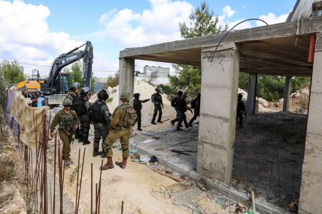 Israeli bulldozers demolish two Palestinian-owned houses in the village of al-Walaja, northwest of the West Bank city of Bethlehem Israeli bulldozers demolish two Palestinian-owned houses in the village of al-Walaja, northwest of the West Bank city of Bethlehem, Palestinain sources confirmed on November 2, 2022. Israeli forces raided the said village and demolished a house owned by local resident Othman al-Shweiki, and demolished another house owned by resident Khitam Ridwan. Photo by Ahmad Tayem APAimages Bethlehem West Bank Palestinian Territory 021122_Bethlehem_AT_00 (3) Copyright: xapaimagesxAhmadxTayemx xapaimagesx