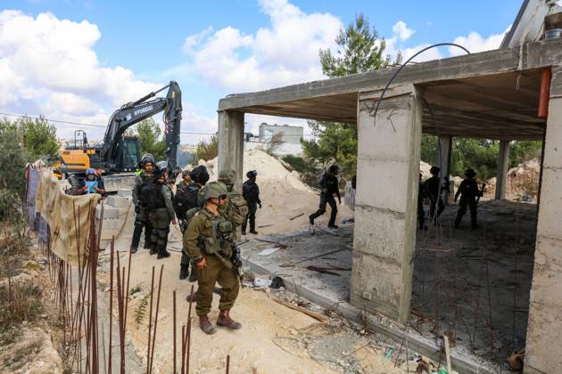 Israeli bulldozers demolish two Palestinian-owned houses in the village of al-Walaja, northwest of the West Bank city of Bethlehem Israeli bulldozers demolish two Palestinian-owned houses in the village of al-Walaja, northwest of the West Bank city of Bethlehem, Palestinain sources confirmed on November 2, 2022. Israeli forces raided the said village and demolished a house owned by local resident Othman al-Shweiki, and demolished another house owned by resident Khitam Ridwan. Photo by Ahmad Tayem APAimages Bethlehem West Bank Palestinian Territory 021122_Bethlehem_AT_00 (4) Copyright: xapaimagesxAhmadxTayemx xapaimagesx
