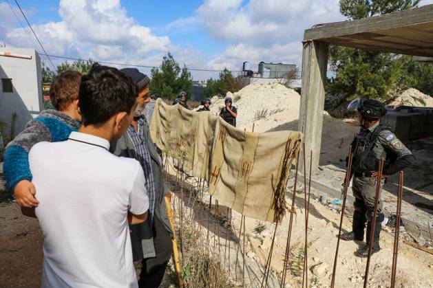 Israeli bulldozers demolish two Palestinian-owned houses in the village of al-Walaja, northwest of the West Bank city of Bethlehem Israeli bulldozers demolish two Palestinian-owned houses in the village of al-Walaja, northwest of the West Bank city of Bethlehem, Palestinain sources confirmed on November 2, 2022. Israeli forces raided the said village and demolished a house owned by local resident Othman al-Shweiki, and demolished another house owned by resident Khitam Ridwan. Photo by Ahmad Tayem APAimages Bethlehem West Bank Palestinian Territory 021122_Bethlehem_AT_00 (1) Copyright: xapaimagesxAhmadxTayemx xapaimagesx