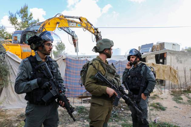 Israeli bulldozers demolish two Palestinian-owned houses in the village of al-Walaja, northwest of the West Bank city of Bethlehem Israeli bulldozers demolish two Palestinian-owned houses in the village of al-Walaja, northwest of the West Bank city of Bethlehem, Palestinain sources confirmed on November 2, 2022. Israeli forces raided the said village and demolished a house owned by local resident Othman al-Shweiki, and demolished another house owned by resident Khitam Ridwan. Photo by Ahmad Tayem APAimages Bethlehem West Bank Palestinian Territory 021122_Bethlehem_AT_00 (13) Copyright: xapaimagesxAhmadxTayemx xapaimagesx