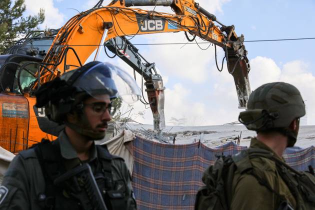 Israeli bulldozers demolish two Palestinian-owned houses in the village of al-Walaja, northwest of the West Bank city of Bethlehem Israeli bulldozers demolish two Palestinian-owned houses in the village of al-Walaja, northwest of the West Bank city of Bethlehem, Palestinain sources confirmed on November 2, 2022. Israeli forces raided the said village and demolished a house owned by local resident Othman al-Shweiki, and demolished another house owned by resident Khitam Ridwan. Photo by Ahmad Tayem APAimages Bethlehem West Bank Palestinian Territory 021122_Bethlehem_AT_00 (14) Copyright: xapaimagesxAhmadxTayemx xapaimagesx