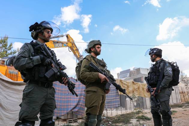 Israeli bulldozers demolish two Palestinian-owned houses in the village of al-Walaja, northwest of the West Bank city of Bethlehem Israeli bulldozers demolish two Palestinian-owned houses in the village of al-Walaja, northwest of the West Bank city of Bethlehem, Palestinain sources confirmed on November 2, 2022. Israeli forces raided the said village and demolished a house owned by local resident Othman al-Shweiki, and demolished another house owned by resident Khitam Ridwan. Photo by Ahmad Tayem APAimages Bethlehem West Bank Palestinian Territory 021122_Bethlehem_AT_00 (16) Copyright: xapaimagesxAhmadxTayemx xapaimagesx