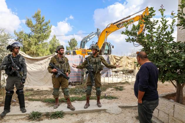 Israeli bulldozers demolish two Palestinian-owned houses in the village of al-Walaja, northwest of the West Bank city of Bethlehem Israeli bulldozers demolish two Palestinian-owned houses in the village of al-Walaja, northwest of the West Bank city of Bethlehem, Palestinain sources confirmed on November 2, 2022. Israeli forces raided the said village and demolished a house owned by local resident Othman al-Shweiki, and demolished another house owned by resident Khitam Ridwan. Photo by Ahmad Tayem APAimages Bethlehem West Bank Palestinian Territory 021122_Bethlehem_AT_00 (20) Copyright: xapaimagesxAhmadxTayemx xapaimagesx