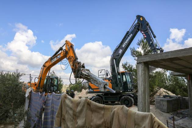 Israeli bulldozers demolish two Palestinian-owned houses in the village of al-Walaja, northwest of the West Bank city of Bethlehem Israeli bulldozers demolish two Palestinian-owned houses in the village of al-Walaja, northwest of the West Bank city of Bethlehem, Palestinain sources confirmed on November 2, 2022. Israeli forces raided the said village and demolished a house owned by local resident Othman al-Shweiki, and demolished another house owned by resident Khitam Ridwan. Photo by Ahmad Tayem APAimages Bethlehem West Bank Palestinian Territory 021122_Bethlehem_AT_00 (10) Copyright: xapaimagesxAhmadxTayemx xapaimagesx