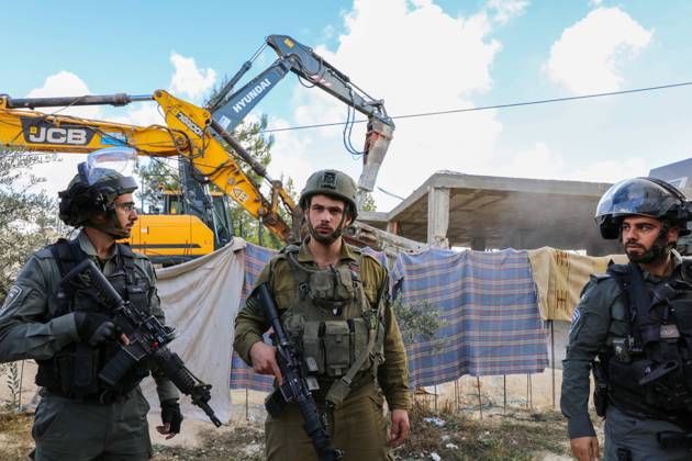 Israeli bulldozers demolish two Palestinian-owned houses in the village of al-Walaja, northwest of the West Bank city of Bethlehem Israeli bulldozers demolish two Palestinian-owned houses in the village of al-Walaja, northwest of the West Bank city of Bethlehem, Palestinain sources confirmed on November 2, 2022. Israeli forces raided the said village and demolished a house owned by local resident Othman al-Shweiki, and demolished another house owned by resident Khitam Ridwan. Photo by Ahmad Tayem APAimages Bethlehem West Bank Palestinian Territory 021122_Bethlehem_AT_00 (11) Copyright: xapaimagesxAhmadxTayemx xapaimagesx