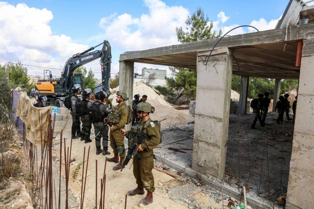 Israeli bulldozers demolish two Palestinian-owned houses in the village of al-Walaja, northwest of the West Bank city of Bethlehem Israeli bulldozers demolish two Palestinian-owned houses in the village of al-Walaja, northwest of the West Bank city of Bethlehem, Palestinain sources confirmed on November 2, 2022. Israeli forces raided the said village and demolished a house owned by local resident Othman al-Shweiki, and demolished another house owned by resident Khitam Ridwan. Photo by Ahmad Tayem APAimages Bethlehem West Bank Palestinian Territory 021122_Bethlehem_AT_00 (5) Copyright: xapaimagesxAhmadxTayemx xapaimagesx