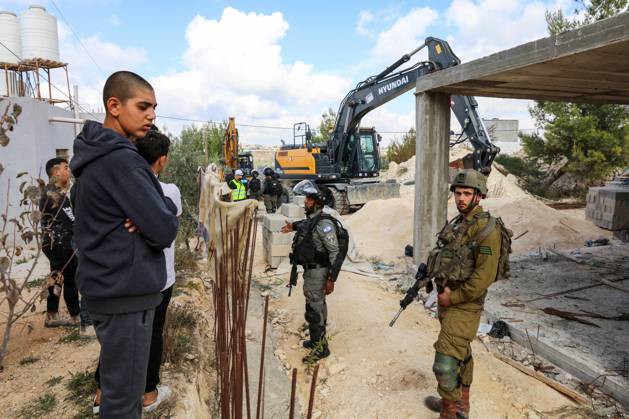 Israeli bulldozers demolish two Palestinian-owned houses in the village of al-Walaja, northwest of the West Bank city of Bethlehem Israeli bulldozers demolish two Palestinian-owned houses in the village of al-Walaja, northwest of the West Bank city of Bethlehem, Palestinain sources confirmed on November 2, 2022. Israeli forces raided the said village and demolished a house owned by local resident Othman al-Shweiki, and demolished another house owned by resident Khitam Ridwan. Photo by Ahmad Tayem APAimages Bethlehem West Bank Palestinian Territory 021122_Bethlehem_AT_00 (7) Copyright: xapaimagesxAhmadxTayemx xapaimagesx