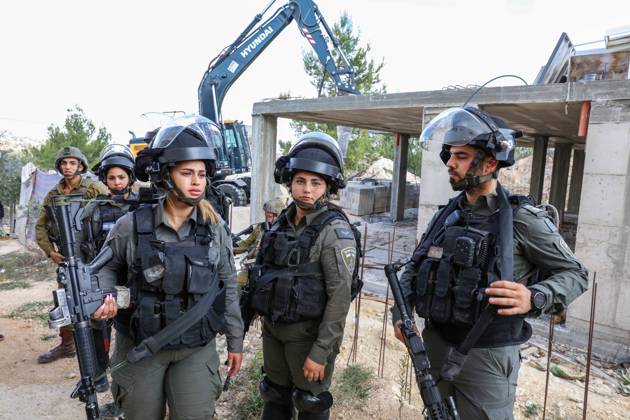 Israeli bulldozers demolish two Palestinian-owned houses in the village of al-Walaja, northwest of the West Bank city of Bethlehem Israeli bulldozers demolish two Palestinian-owned houses in the village of al-Walaja, northwest of the West Bank city of Bethlehem, Palestinain sources confirmed on November 2, 2022. Israeli forces raided the said village and demolished a house owned by local resident Othman al-Shweiki, and demolished another house owned by resident Khitam Ridwan. Photo by Ahmad Tayem APAimages Bethlehem West Bank Palestinian Territory 021122_Bethlehem_AT_00 (8) Copyright: xapaimagesxAhmadxTayemx xapaimagesx