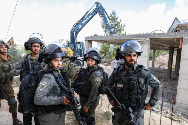 Israeli bulldozers demolish two Palestinian-owned houses in the village of al-Walaja, northwest of the West Bank city of Bethlehem Israeli bulldozers demolish two Palestinian-owned houses in the village of al-Walaja, northwest of the West Bank city of Bethlehem, Palestinain sources confirmed on November 2, 2022. Israeli forces raided the said village and demolished a house owned by local resident Othman al-Shweiki, and demolished another house owned by resident Khitam Ridwan. Photo by Ahmad Tayem APAimages Bethlehem West Bank Palestinian Territory 021122_Bethlehem_AT_00 (9) Copyright: xapaimagesxAhmadxTayemx xapaimagesx