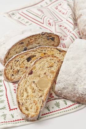 Slices of Christmas stollen cake on napkin, YDF00038