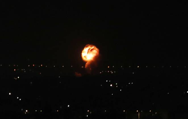 Fire and smoke billowing in the background following an Israeli air strike on Khan Yunis, Fire and smoke billowing in the background following an Israeli air strike on Khan Yunis, southern Gaza Strip, on 4 Nobember,2022. photo by Ashraf Amra Gaza Gaza Strip Occupied Palestinian Territory 041122_Gaza_ASH_00 (6) Copyright: xxAshrafxAmra APAimagesx