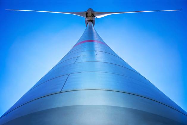 windturbine wind turbine against a blue sky Copyright: xZoonar.com frankxpetersx 12322354